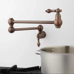 Signature Hardware Vivan Retractable Wall-mount Pot Filler Faucet Bronze. Fixed Price $219.99.