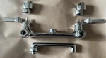 Chicago Faucets 540 LDE35XKABCP Double Handle Wall Mount Faucet, New Open Box. Fixed Price $300.00.