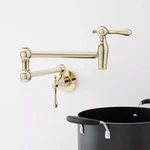 Signature Hardware Vivan Retractable Wall-mount Pot Filler, Polished Brass. Fixed Price $279.95.