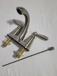 Moen 6610BN Brushed Nickel Two Lever Bathroom Spigot. Fixed Price $69.99.